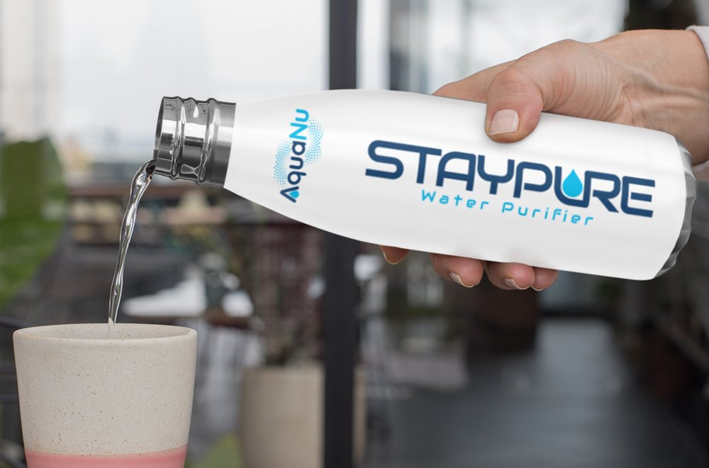 AquaNu StayPure Bottle Being Poured
