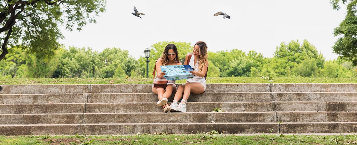 Two Girls With Map Mobile